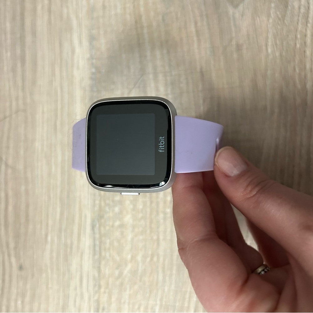 Fitbit Versa Lite Edition in purple. S/P and L/G bands.